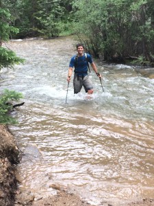 Day 7. Charlie crossing the creek at the base of Elbert.  They came down so fast, we made him get back in the water to take this picture.